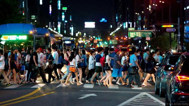 Seoul residents live a very fast-paced life (Credit: Credit: Ed Jones/Getty)